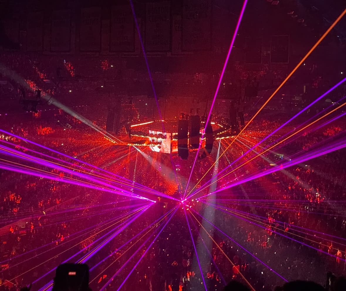 Tame Impala's Deadbeat tour filling TD Garden with red, purple, and orange laser beams
