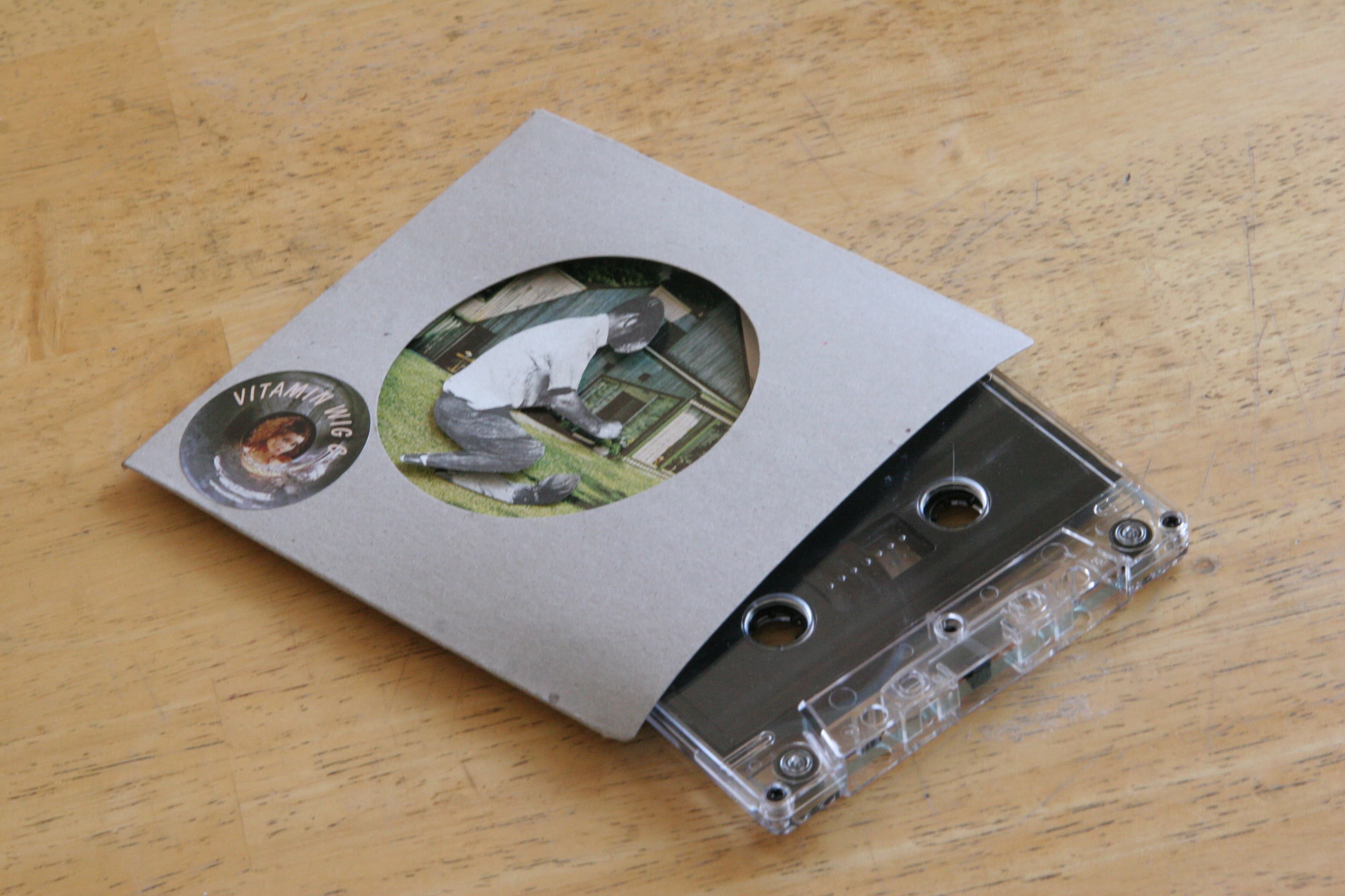 A handmade Vitamin Wig C cassette and sleeve for Ouroboros Nevada